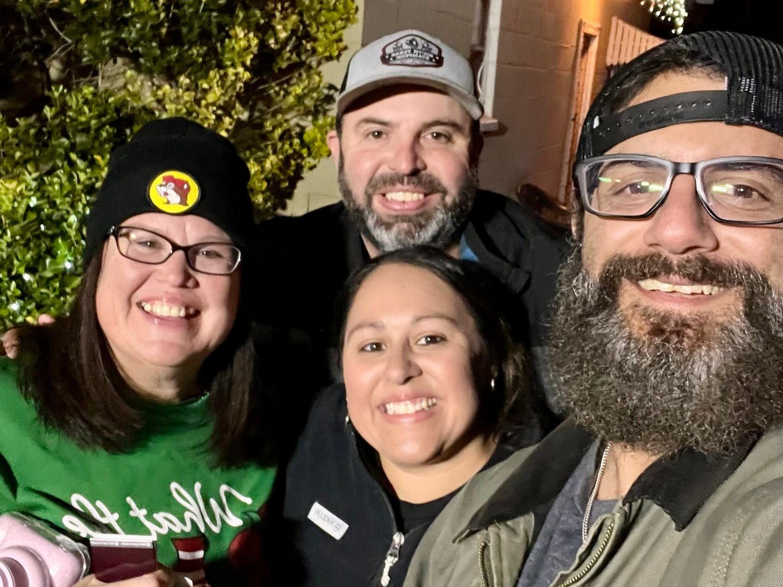 Four South Texas Stampede team members smiling together at the Winter Wonderland Cookoff
